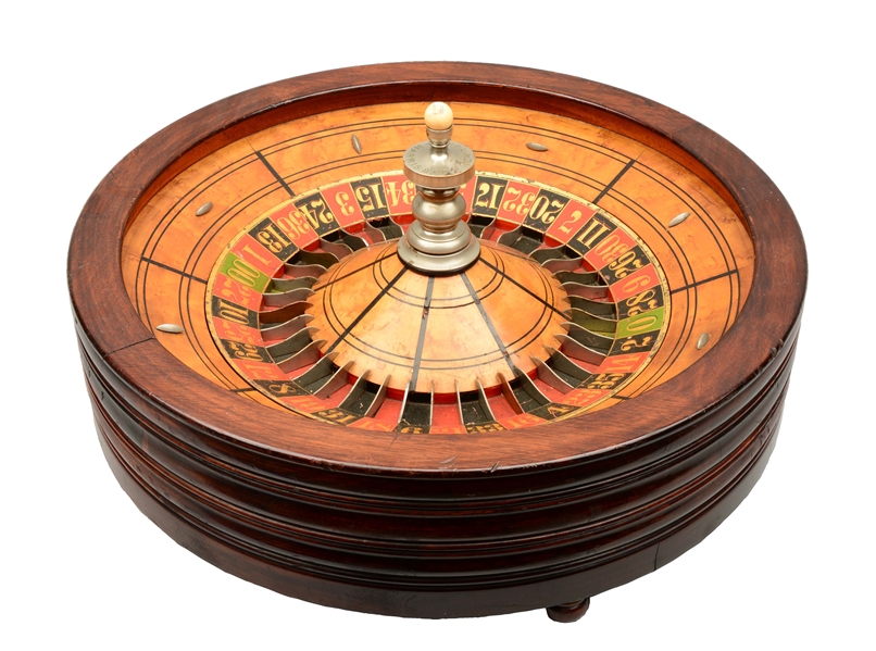 TABLE TOP MAHOGANY ROULETTE WHEEL.
