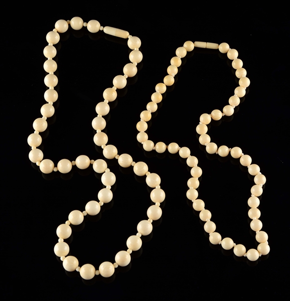 LOT OF 2: BEADED IVORY NECKLACES. 