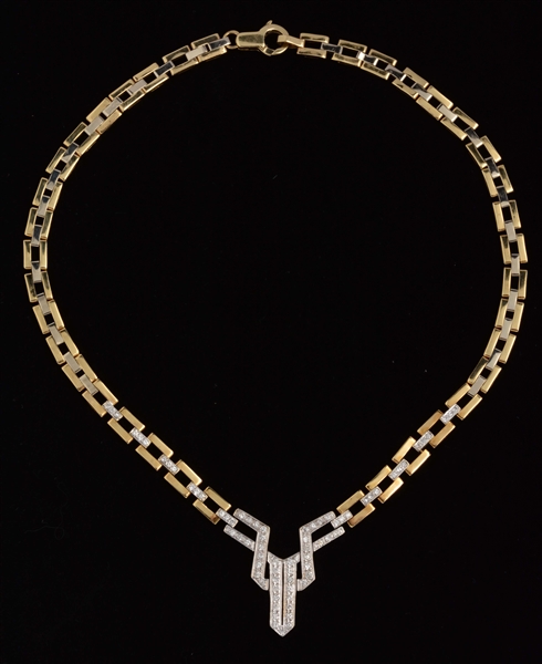 14K GOLD TWO TONE & ABSTRACT DESIGN DIAMOND NECKLACE.