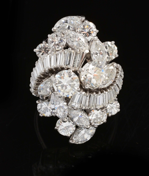 VERY IMPRESSIVE LARGE COCKTAIL RING W/ 18.17 CARATS.
