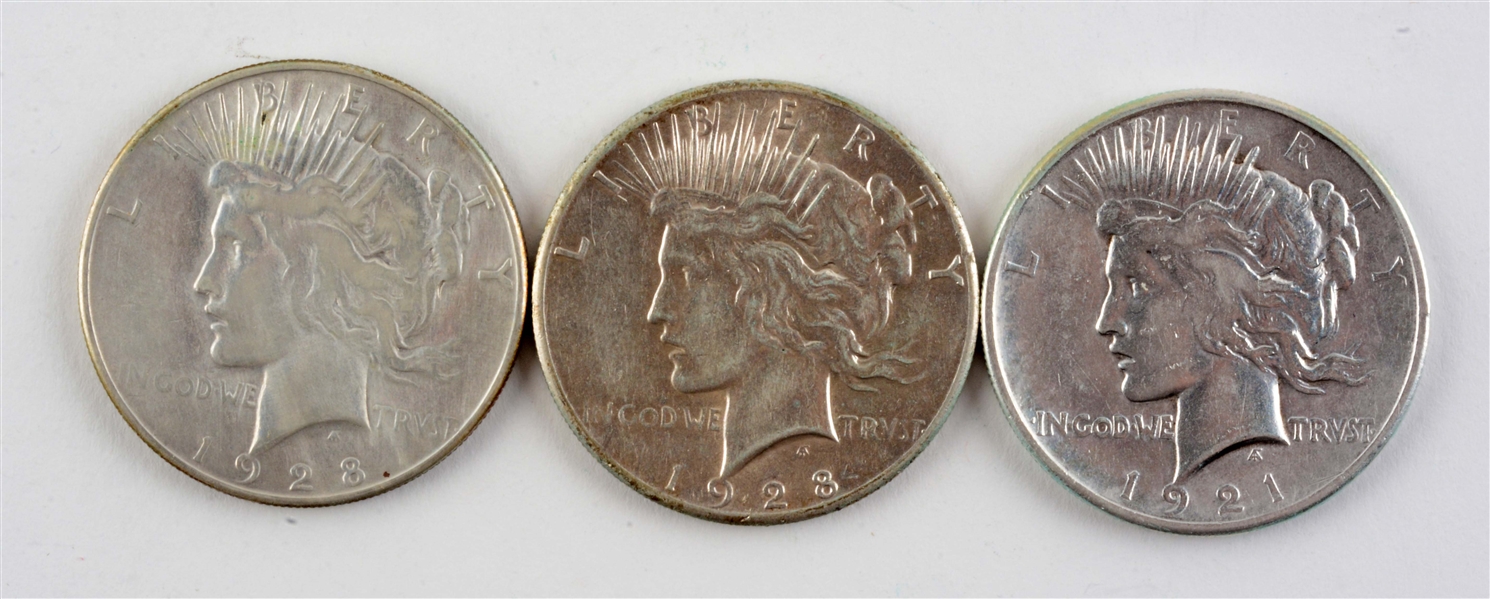LOT OF 3: PEACE SILVER DOLLARS.