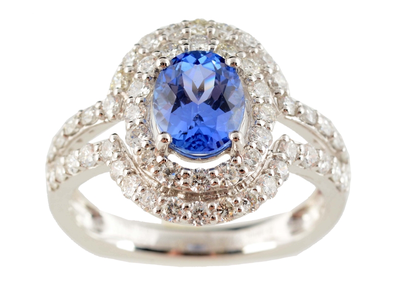 A 1.61 CARAT BLUE SAPPHIRE, DIAMOND & PLATINUM RING.