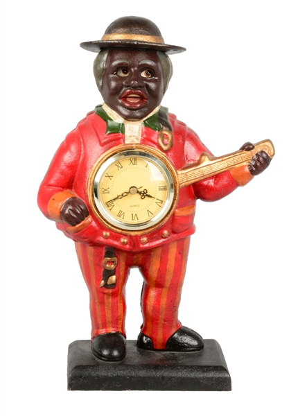 BLACK AMERICAN BANJO CLOCK WITH MOVABLE EYES.