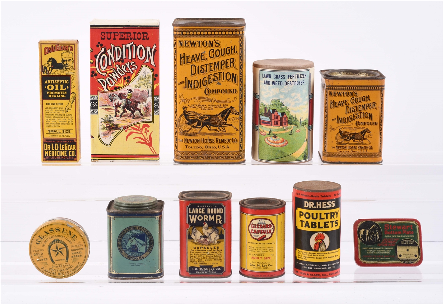 LOT OF 11: EARLY VETERINARIAN TINS.