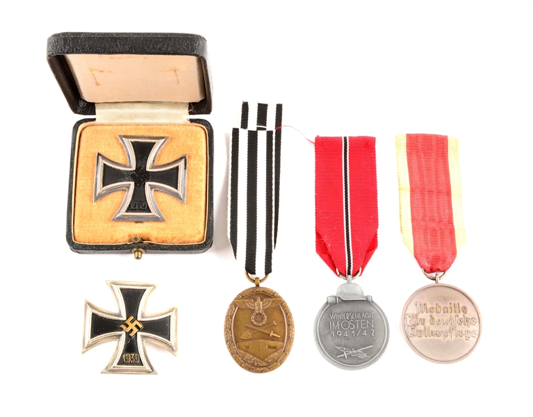 LOT OF 5: WWII GERMAN EKIS AND MEDALS.