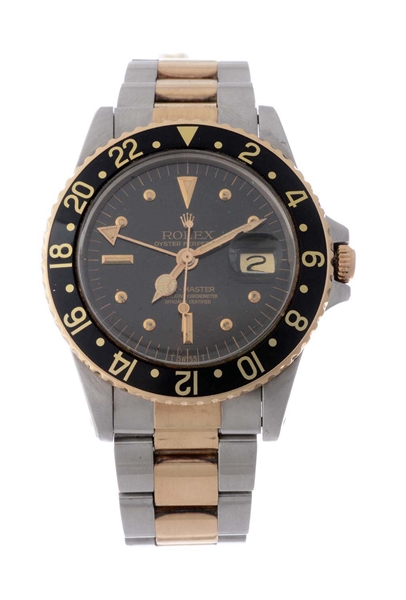 VINTAGE ROLEX 18K YELLOW GOLD AND STAINLESS STEEL GMT-MASTER WRISTWATCH MODEL NUMBER 1675.