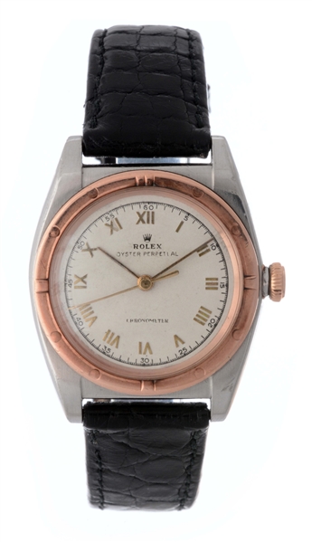 VINTAGE ROLEX 14K ROSE GOLD AND STAINLESS STEEL BUBBLE BACK WRISTWATCH MODEL NUMBER 3372.
