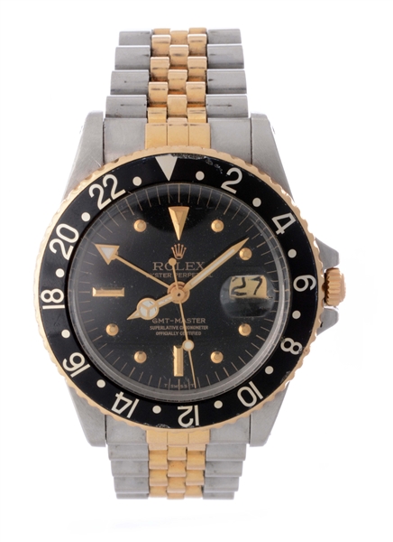 VINTAGE ROLEX 14K YELLOW GOLD AND STAINLESS STEEL GMT-MASTER WRISTWATCH MODEL NUMBER 1675.