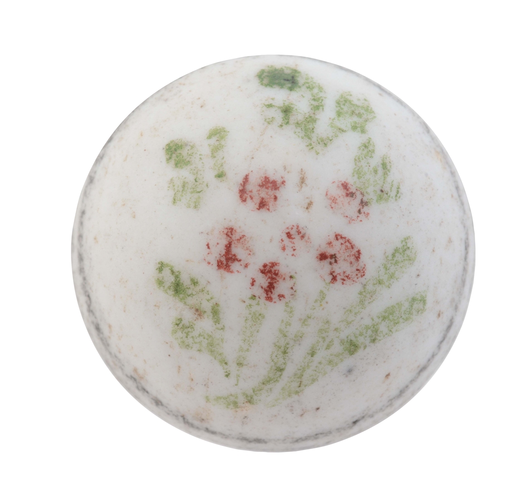 EARLY PERIOD RED DOT FLOWERED CHINA MARBLE.
