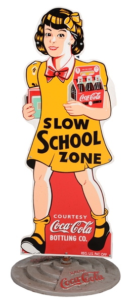 COCA-COLA SLOW FOR THE SCHOOL ZONE REPRODUCTION TIN SIGN.