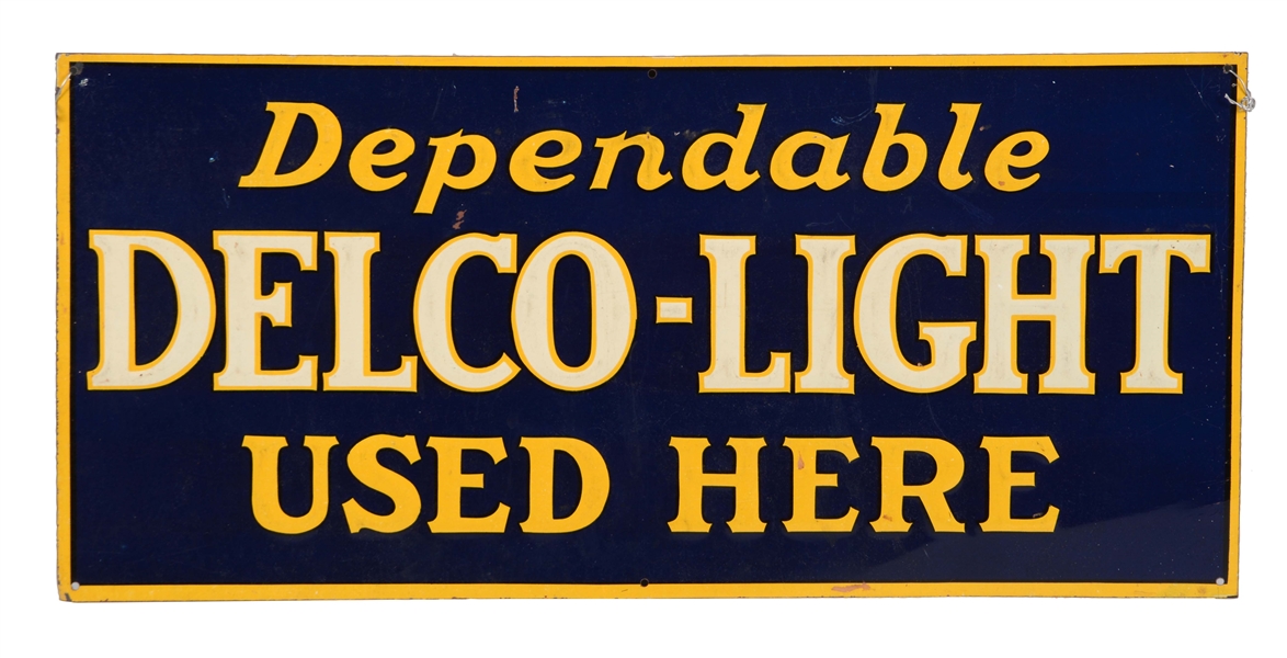 DEPENDABLE DELCO LIGHT USED HERE EMBOSSED TIN SIGN.