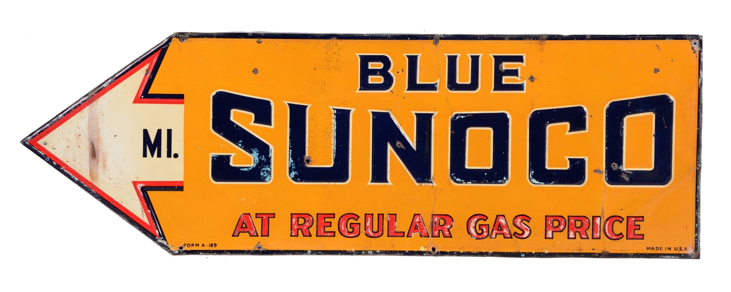 BLUE SUNOCO EMBOSSED TIN SIGN WITH ARROW GRAPHIC.