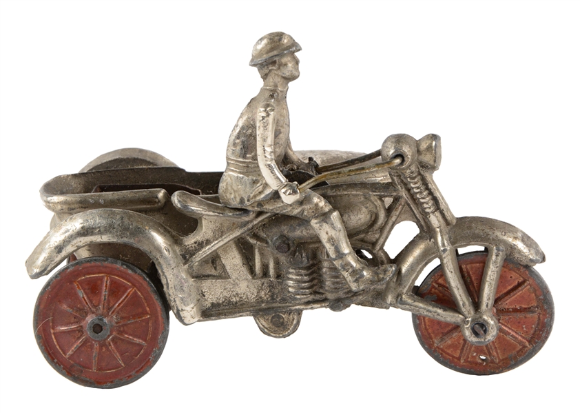 EXTREMELY UNUSUAL PRE-WAR WIND-UP DIE-CAST AND METAL MOTORCYCLE WITH SIDECAR.
