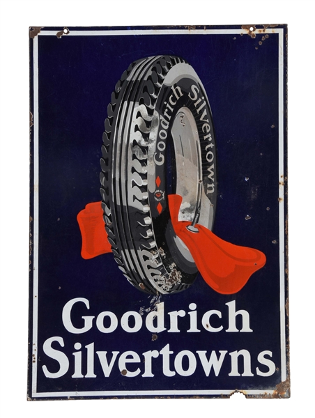 GOODRICH SILVERTOWNS TIRES PORCELAIN SIGN WITH TIRE & TUBE GRAPHIC.
