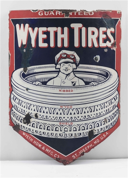 WYETH TIRES CURVED PORCELAIN SIGN WITH BOY IN THE TIRE GRAPHIC.