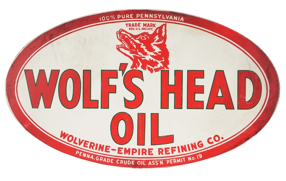 WOLFS HEAD MOTOR OIL TIN SIGN W/ WOLF GRAPHIC. 