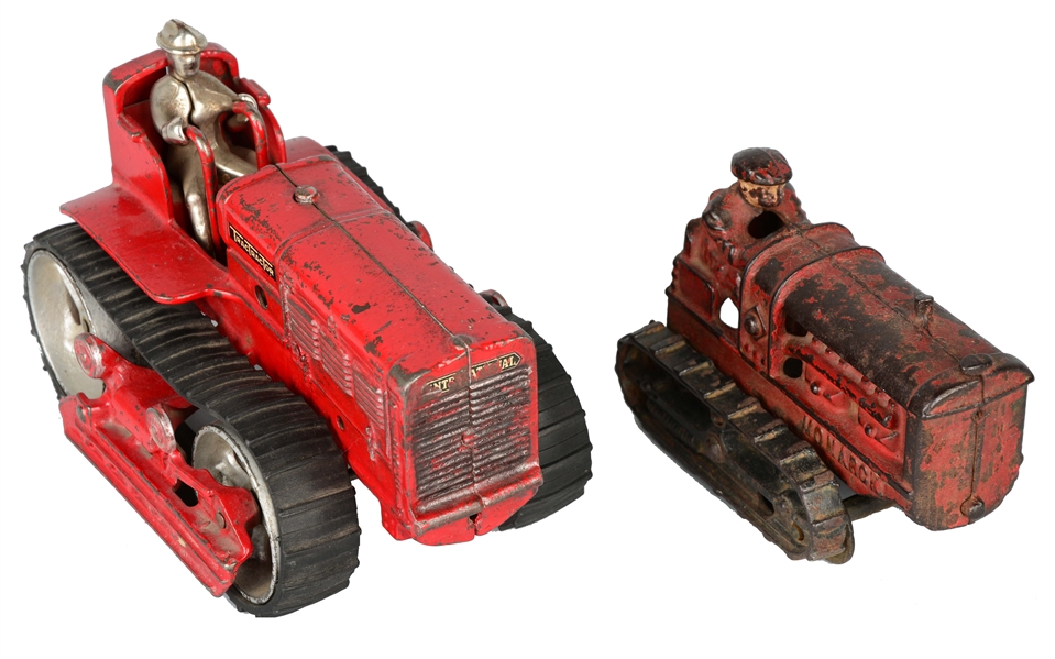LOT OF 2: CAST IRON TRACTOR TOYS. 