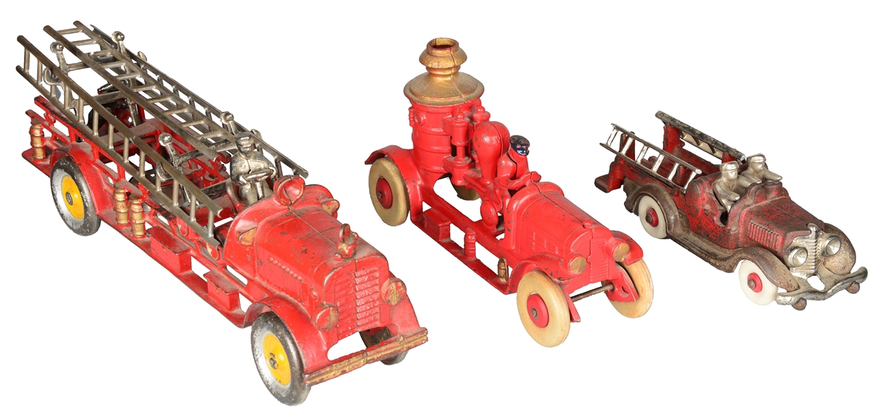 LOT OF 3: RED PAINTED CAST IRON FIRE TRUCKS. 
