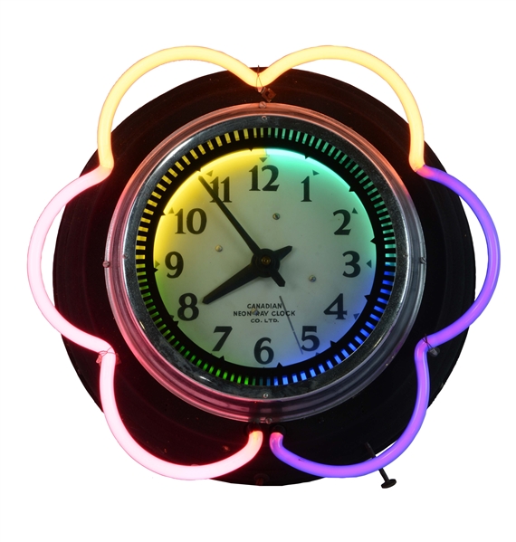 CANADIAN NEON RAY SPINNER CLOCK SIGN WITH SEVEN COLOR NEON.