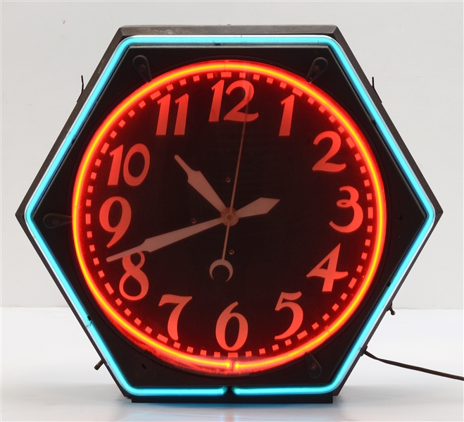 HEXAGON SHAPED TWO COLOR NEON CLOCK.