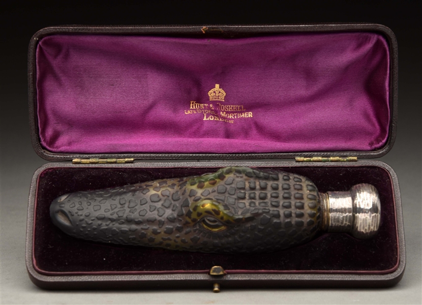 RARE ALLIGATOR BOTTLE FLASK WITH SILVER TOP.