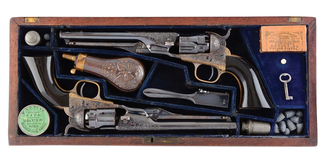 (A) SPECTACULAR & EXTREMELY RARE FACTORY ENGRAVED EBONY GRIPPED DOUBLE CASED PAIR OF COLT MODEL 1862 POLICE REVOLVERS PRESENTED TO CAPTAIN W.H.H. WALLER (1865).