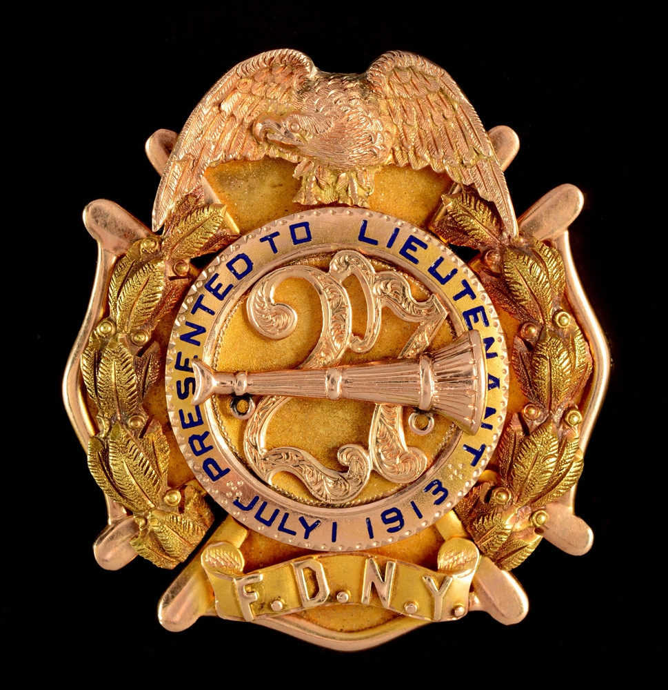14K GOLD 27 YEAR BADGE FROM FDNY.