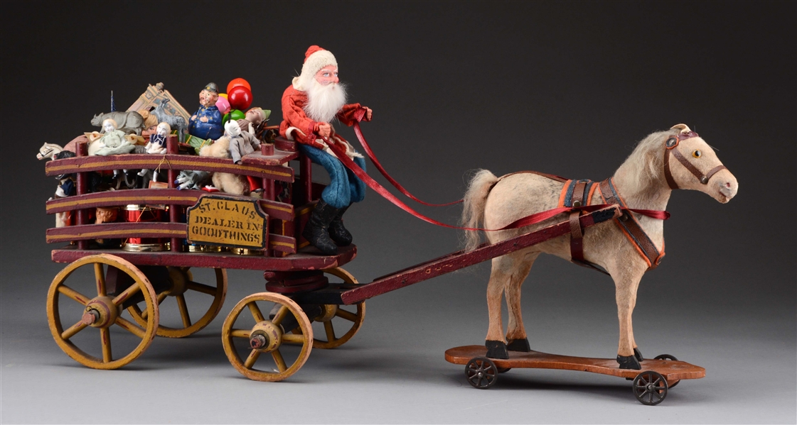 CHRISTMAS ST. CLAUS WAGON FILLED WITH TOYS.