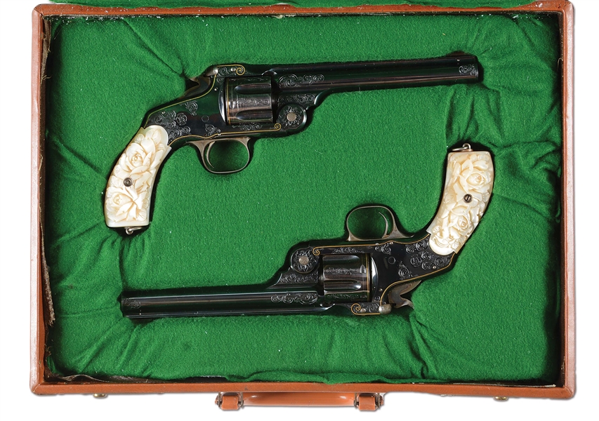 (A) CASED PAIR OF JAPANESE ENGRAVED SMITH & WESSON NO. 3 REVOLVERS WITH CARVED PEARL GRIPS.