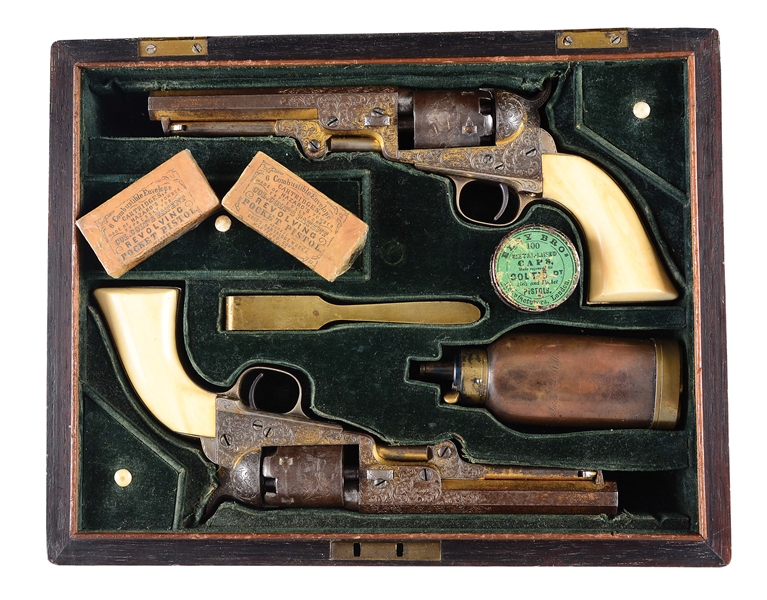 (A) CASED PAIR OF ENGRAVED COLT 1849 POCKET REVOLVERS PRESENTED TO ADMIRAL JAUN WILLIAMS.