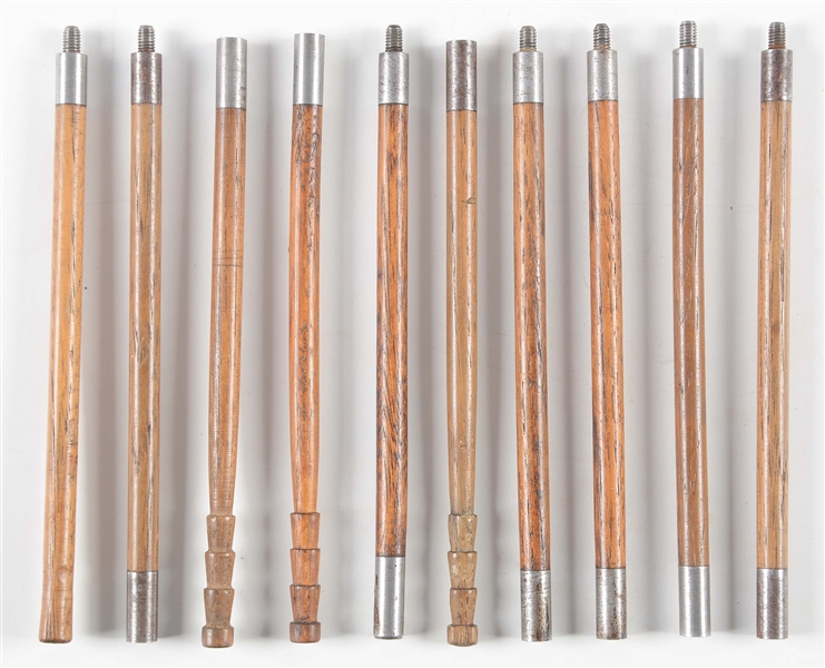TEN SECTIONS OF HENRY HICKORY CLEANING RODS WITH IRON COUPLINGS.