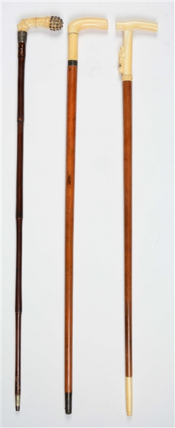 LOT OF 3: ANTIQUE WALKING STICK CANES WITH IVORY HANDLES.