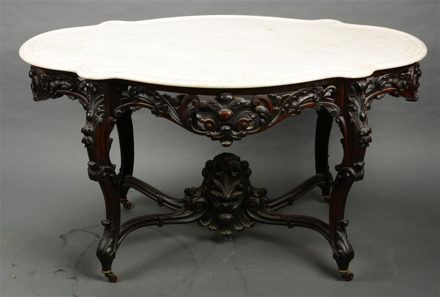 ROCOCCO VICTORIAN CARVED WALNUT MARBLE TOP CENTER TABLE.