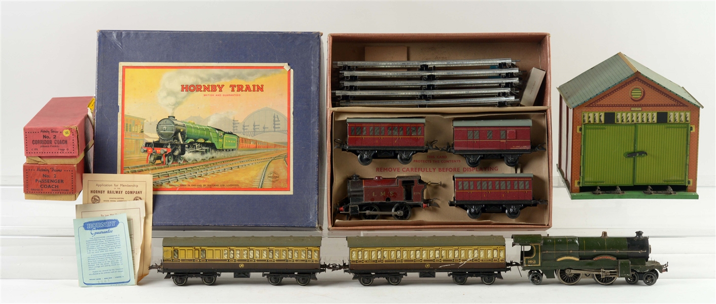 LOT OF 5: HORNBY TIN TRAIN GARAGE AND HORNBY TRAINS SETS. 