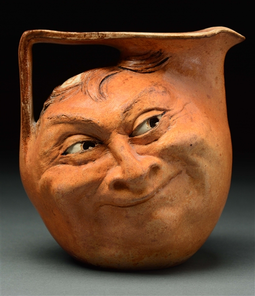 MARTIN BROS. DOUBLE SIDED FACE JUG.