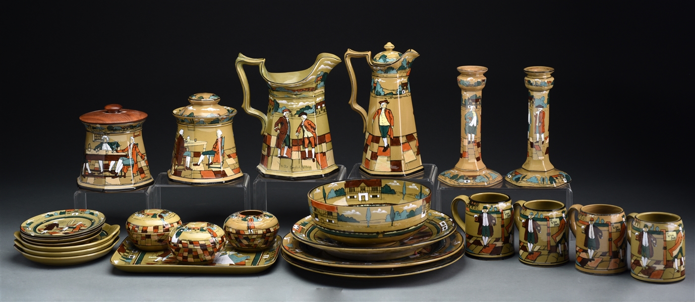 GROUP OF BUFFALO DELDARE POTTERY INCLUDING EXAMPLES OF "YE LION INN", "YE OLDEN DAYS" AND "YE VILLAGE TAVERN". 