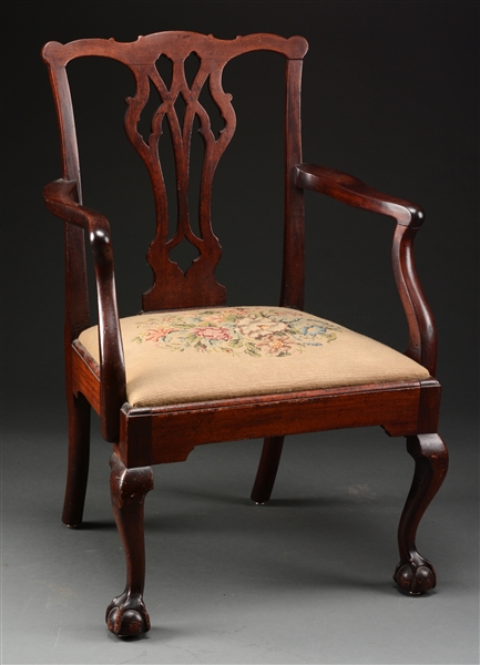 CHIPPENDALE CARVED MAHOGANY ARMCHAIR.