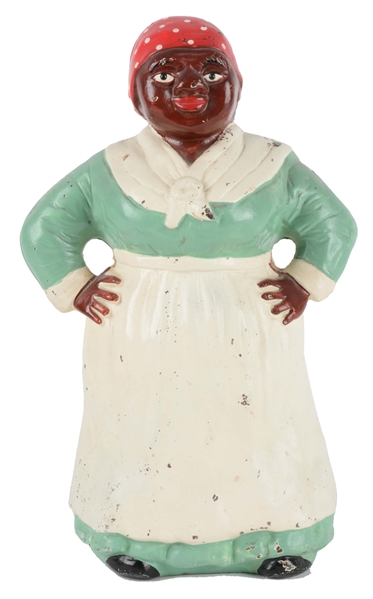 CAST IRON SOUTHERN MAMMY W/ HANDS ON HIPS DOORSTOP. 