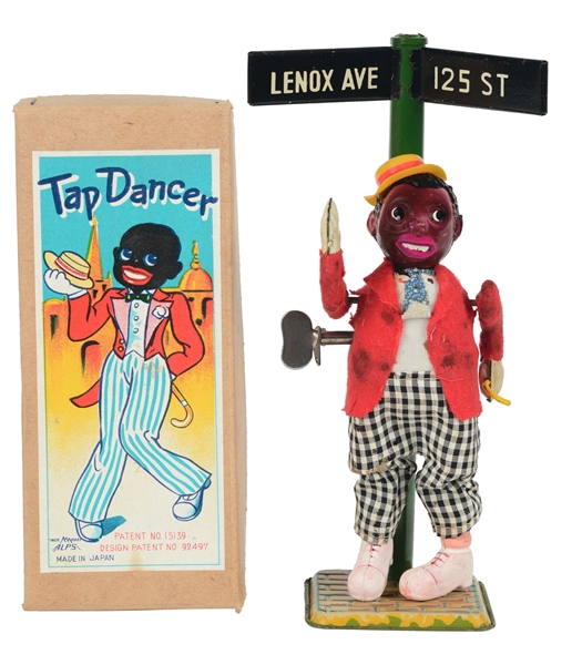 TIN LITHO AND CELLULOID WIND UP AFRICAN AMERICAN TAP DANCER.