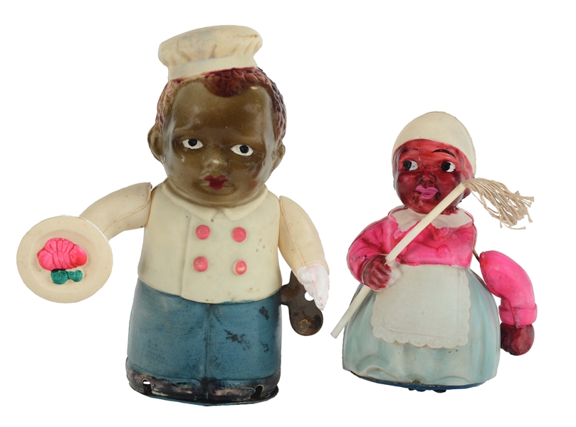 LOT OF 2: CELLULOID AND TIN WIND UP BLACK AMERICANA TOYS.