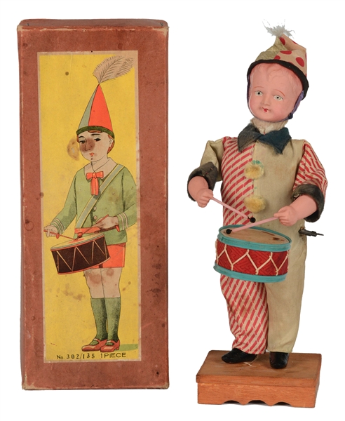 LARGE CELLULOID PRE-WAR JAPANESE WIND UP DRUMMING CLOWN.