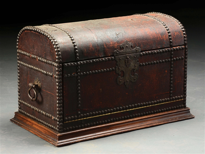 LEATHER-BOUND AND BRASS-STUDDED DOME-TOP PICNIC TRUNK.