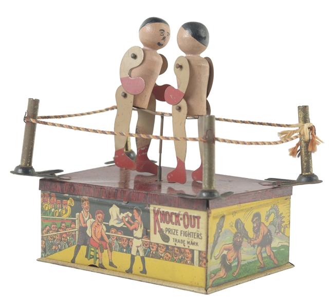 STRAUSS TIN LITHO KNOCK OUT WIND UP TOY. 