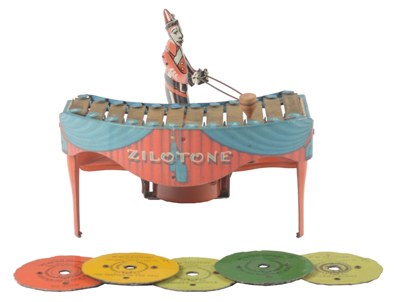 WOLVERINE TIN LITHO WIND UP ZILOTONE PLAYER. 