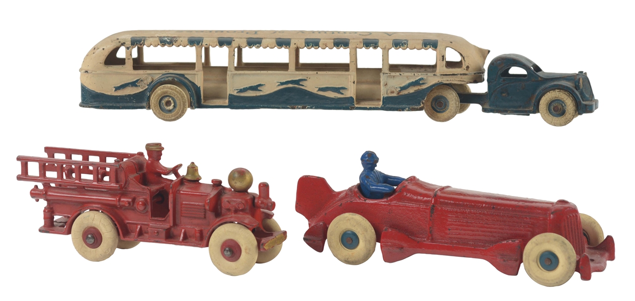 LOT OF 3: CAST IRON AMERICAN-MADE VEHICLE TOYS.