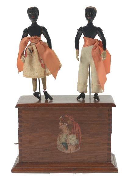 EARLY AMERICAN IVES CLOCKWORK DANCERS TOY.