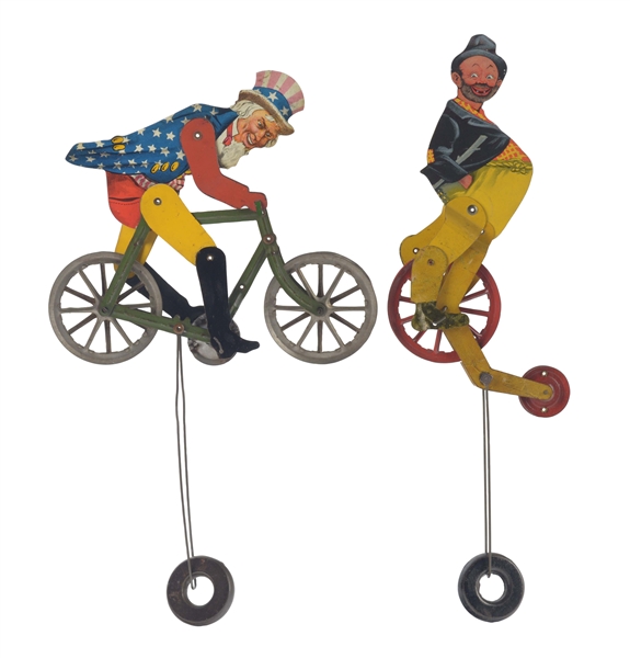 LOT OF 2: EARLY AMERICAN MADE TIN LITHO BALANCE CYCLE TOYS. 