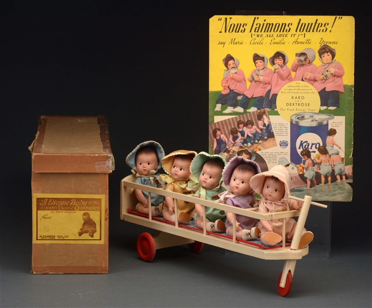 DIONNE QUINTUPLETS IN CART WITH ORIGINAL BOX.