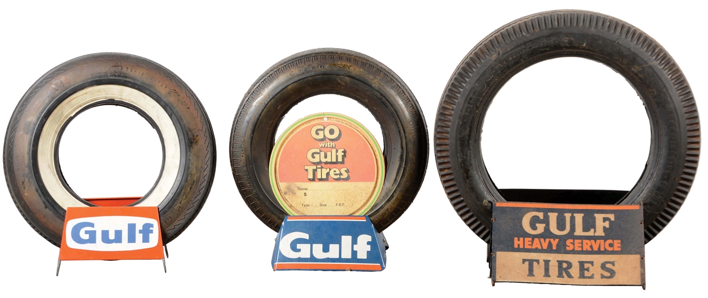 LOT OF 3: GULF TIRES IN TIN TIRE STANDS.