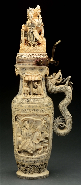 HIGHLY CARVED ORIENTAL IVORY JUG WITH HINGED LID.
